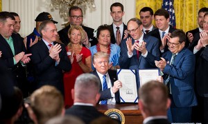 Trump signs new law to protect whistleblowers at Department
